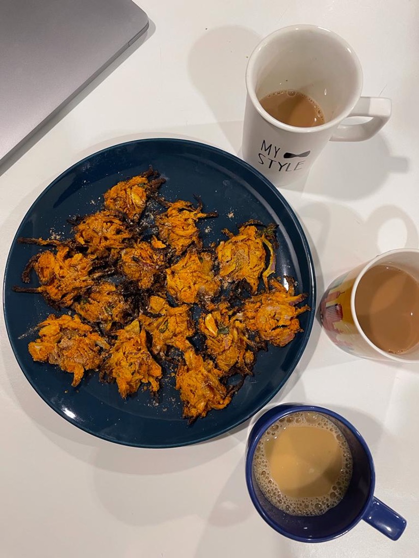 Oven baked Onion fritters with a cup of warm Chai