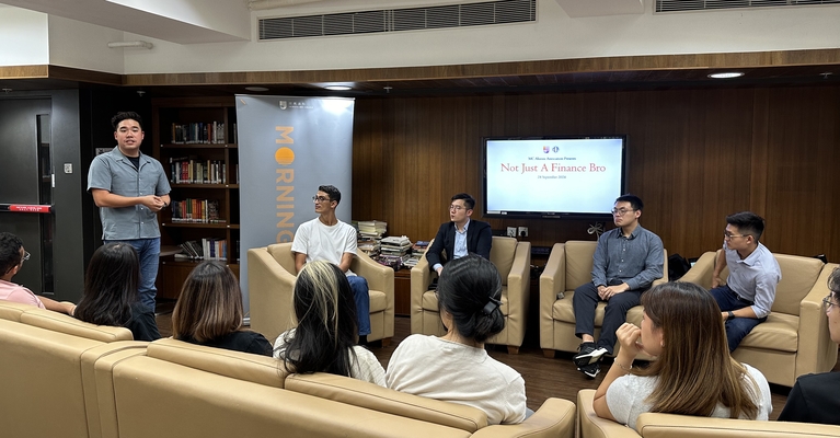 MCAA President Gavin Yip talks to students.