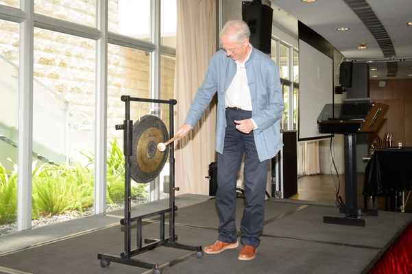 College Master Professor Nick Rawlins rings the gong to begin lunch.