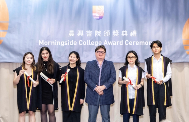 Students receiving award with Morningside College fellow.