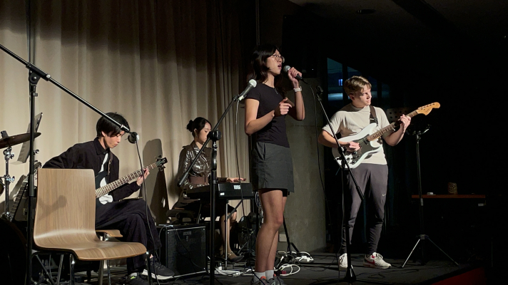 A band of four performs