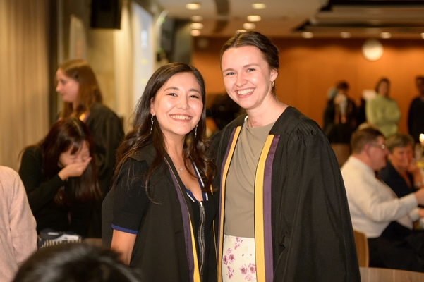 Junior Fellow Kait and Resident Tutor Zhamilya pose for a photo.