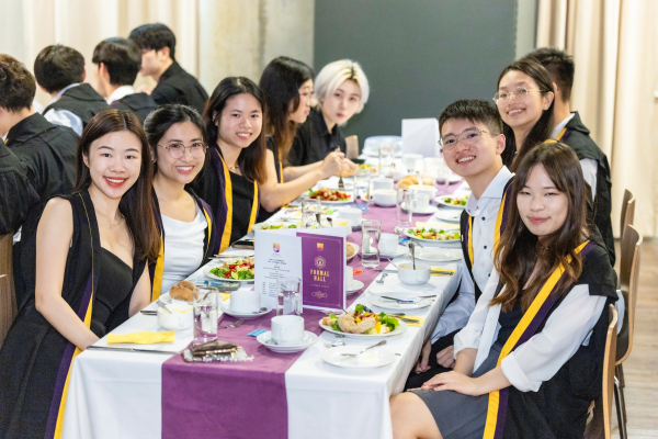 MC students dressed in their college gowns.