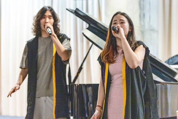 Two Resident Tutors, Joyce Lee and Aaron Li, sang an impromptu duet