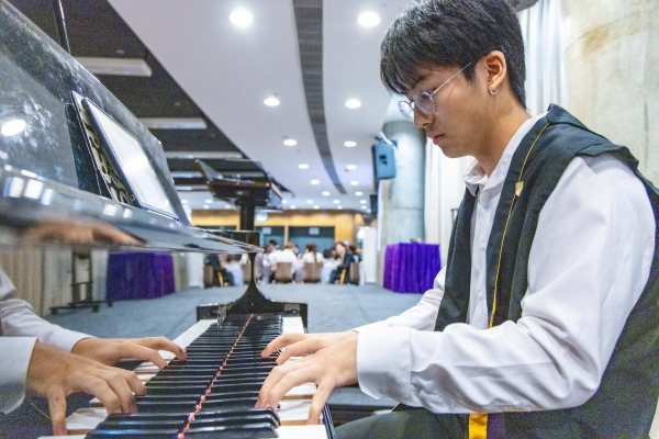 Thanapon Maiseaumsook (Computer Science, Year 2) on the piano