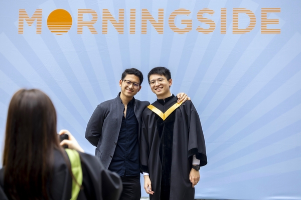 Morningside graduates pose for photo.
