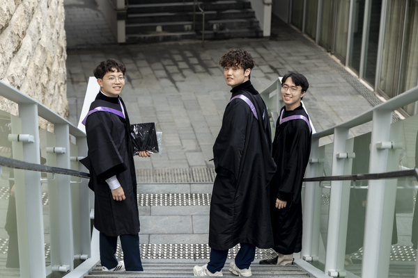 Morningside graduates pose for photo.