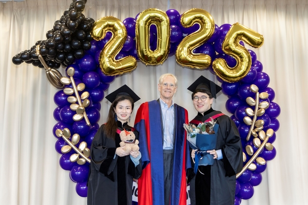 Morningside graduates pose for photo with College Master Professor Nick Rawlins.