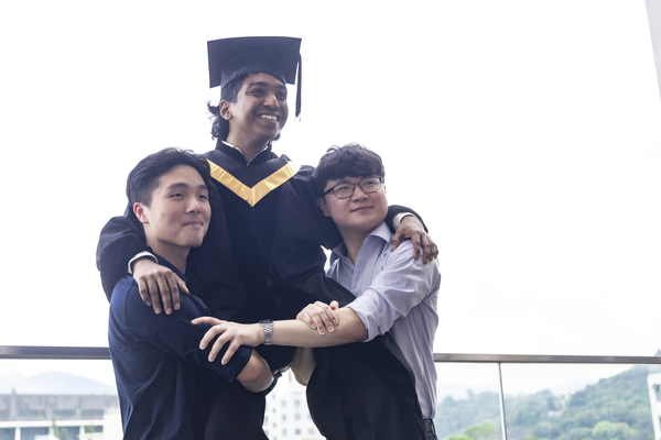 Morningside graduates pose for photo.