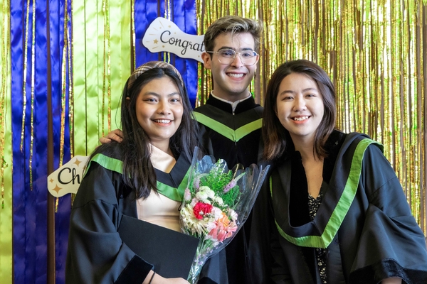 Morningside graduates pose for photo.