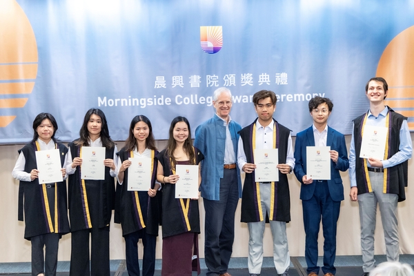 The awardees gather for a photo with College Master Professor Nick Rawlins.
