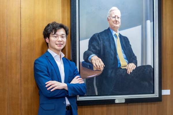 Maxwell Choi, recipient of the first James A. Mirrlees Postgraduate Scholarship.