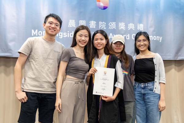 Awardees posing for a photo together.