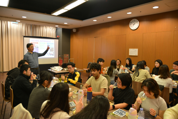 The students listening to sommelier Perry Mok.