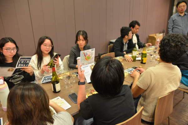 Students looking through the informational pamphlet.