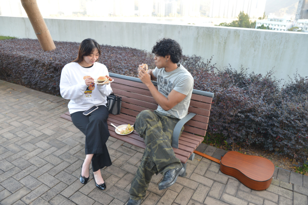 Morningside students enjoying the sunny afternoon BBQ.