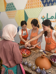 Enjoying a cooking class at Amal Association.