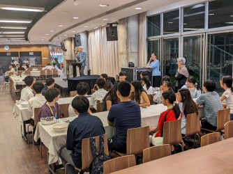 Students at a communal dinner