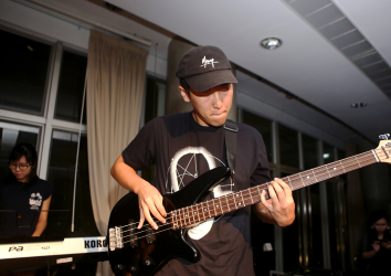 A Student Playing the Bass