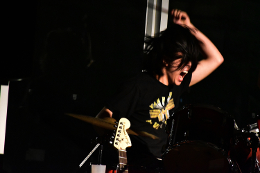 James Jeon playing the drums