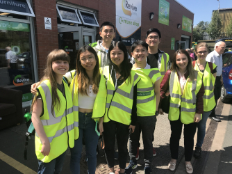 Students at a warehouse tour of Revive Leeds